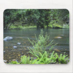 The Hellyer River flows peacefully through a Mouse Pads