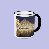The night view of the glass Pyramid of Musee du mugs