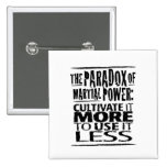 The Paradox of Martial Power Pinback Buttons