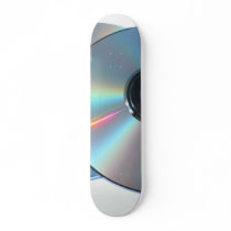 Three Cds On A Paper Skateboards