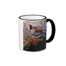 Three ducks in a pond coffee mug