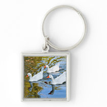 three geese swimming keychains