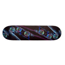 Three glass marbles rolling on smooth surface skateboard