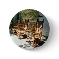 Three Wooden Rocking Chairs on Sunny Porch