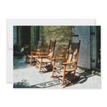 Three Wooden Rocking Chairs on Sunny Porch