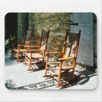 Three Wooden Rocking Chairs on Sunny Porch