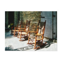 Three Wooden Rocking Chairs on Sunny Porch