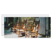 Three Wooden Rocking Chairs on Sunny Porch
