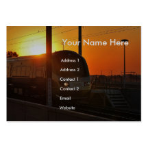 Train at sunset business card