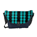 Turquoise pop art flowers over black bag commuter bag