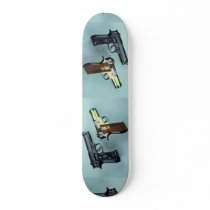 Two .45 calibre automatic guns for gun lovers skate boards