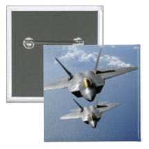 Two F-22 Raptors fly over the Pacific Ocean Pinback Button