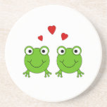 Two green frogs with red hearts. beverage coaster