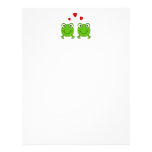 Two green frogs with red hearts. letterhead template
