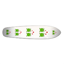 Two green frogs with red hearts. skate board