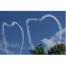two hearts drawn by airplanes over palm trees.jpg photo cutout