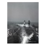 Two people waterskiing post card