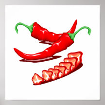 Two red chili peppers one cut up also poster