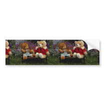 Two smokey bear dolls placed in garden bench bumper sticker