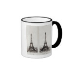 Two views of the construction of the Eiffel Coffee Mugs