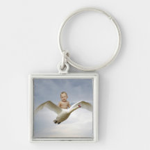 Un bébé et le ciel de cygne porte-clef