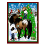 Une carte postale de Noël de cheval et d'enfant