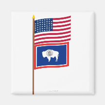 US 44-star flag on pole with Wyoming Magnets