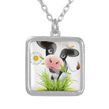 Vache du Holstein dans l'herbe Colliers