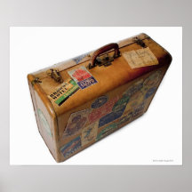 valise démodée avec des autocollants de voyage posters