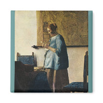 Vermeer's Woman in Blue Reading a Letter ca.1665