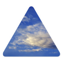 Very structured cloud in a beautiful blue sky triangle sticker