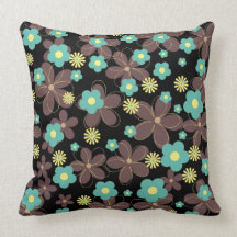 Vibrant floral design on black background throw pillows