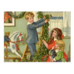 Victorian Children Decorating for Christmas Post Card