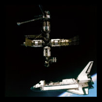 View from Soyuz of Shuttle Atlantis departing Mir posters