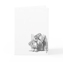 Vintage Alice in Wonderland looking for the door