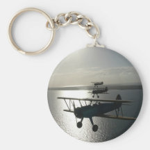 Vintage bi-planes in formation keychains
