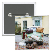 Vintage car with lots of luggage button