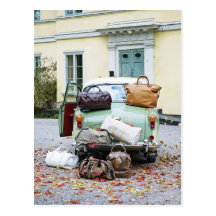 Vintage car with lots of luggage postcard