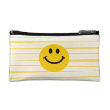 Visage souriant sur les rayures jaunes ensoleillée trousses make-up