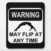 Warning may flip mouse pads