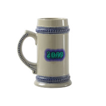 We Survived 2009 mug blue 3 - © Angel Honey, 2009 mugs