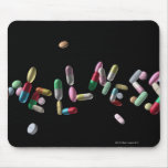 'WELLNESS' written with pills Mouse Pad