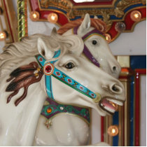 White carousel horse with blue bridle picture photo cut out