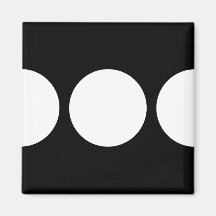 White Circles on Black Fridge Magnets