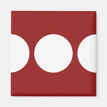 White Circles on Red Magnets