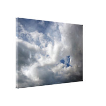 White fluffy clouds on the blue sky gallery wrapped canvas
