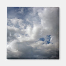 White fluffy clouds on the blue sky fridge magnets