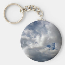 White fluffy clouds on the blue sky key chains