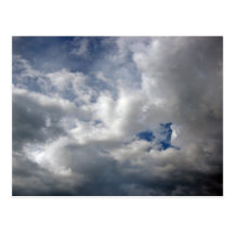 White fluffy clouds on the blue sky postcards