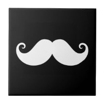 White gentleman handlebar moustache on black tiles